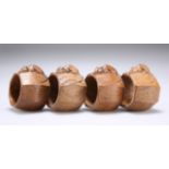 ROBERT THOMPSON OF KILBURN, A SET OF FOUR MOUSEMAN OAK NAPKIN RINGS