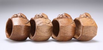 ROBERT THOMPSON OF KILBURN, A SET OF FOUR MOUSEMAN OAK NAPKIN RINGS