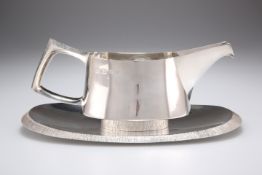 CHRISTOPHER NIGEL LAWRENCE (BORN 1936), AN ELIZABETH II SILVER SAUCE BOAT ON STAND