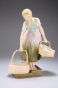 AN ERNST WAHLISS POTTERY FIGURE OF A GIRL, CIRCA 1900