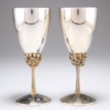 STUART DEVLIN (1931-2018), A PAIR OF ELIZABETH II PARCEL-GILT SILVER GOBLETS