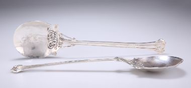 AN UNUSUAL PAIR OF EDWARDIAN SPOT-HAMMERED SILVER SERVING SPOONS