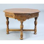 A JACOBEAN REVIVAL OAK CENTRE TABLE, BY GILLOWS, LATE 19TH CENTURY, the moulded octagonal top