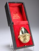 STUART DEVLIN (1931-2018), AN 18 CARAT GOLD GEM-SET EGG