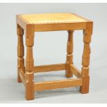 ROBERT THOMPSON OF KILBURN, A MOUSEMAN OAK DRESSING TABLE STOOL