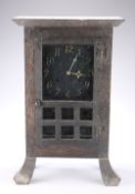 AN AMERICAN ARTS AND CRAFTS OAK MANTEL CLOCK