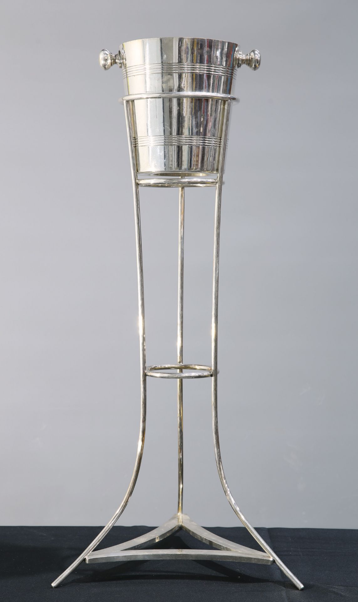 AN ART DECO SILVER-PLATED ICE BUCKET ON STAND