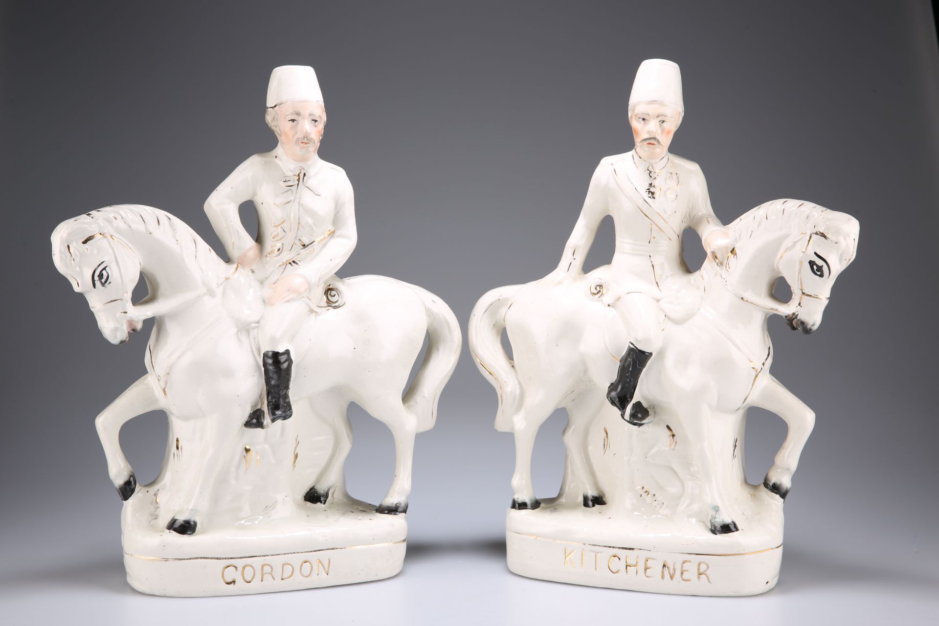 TWO STAFFORDSHIRE FLAT-BACK POTTERY FIGURES