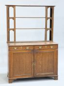 A GEORGE III DRESSER AND RACK