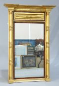 A REGENCY PARCEL-GILT ROSEWOOD PIER MIRROR