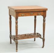 A LATE VICTORIAN MAHOGANY GAMES TABLE