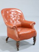 A LEATHER UPHOLSTERED MAHOGANY LIBRARY CHAIR BY GILLOWS