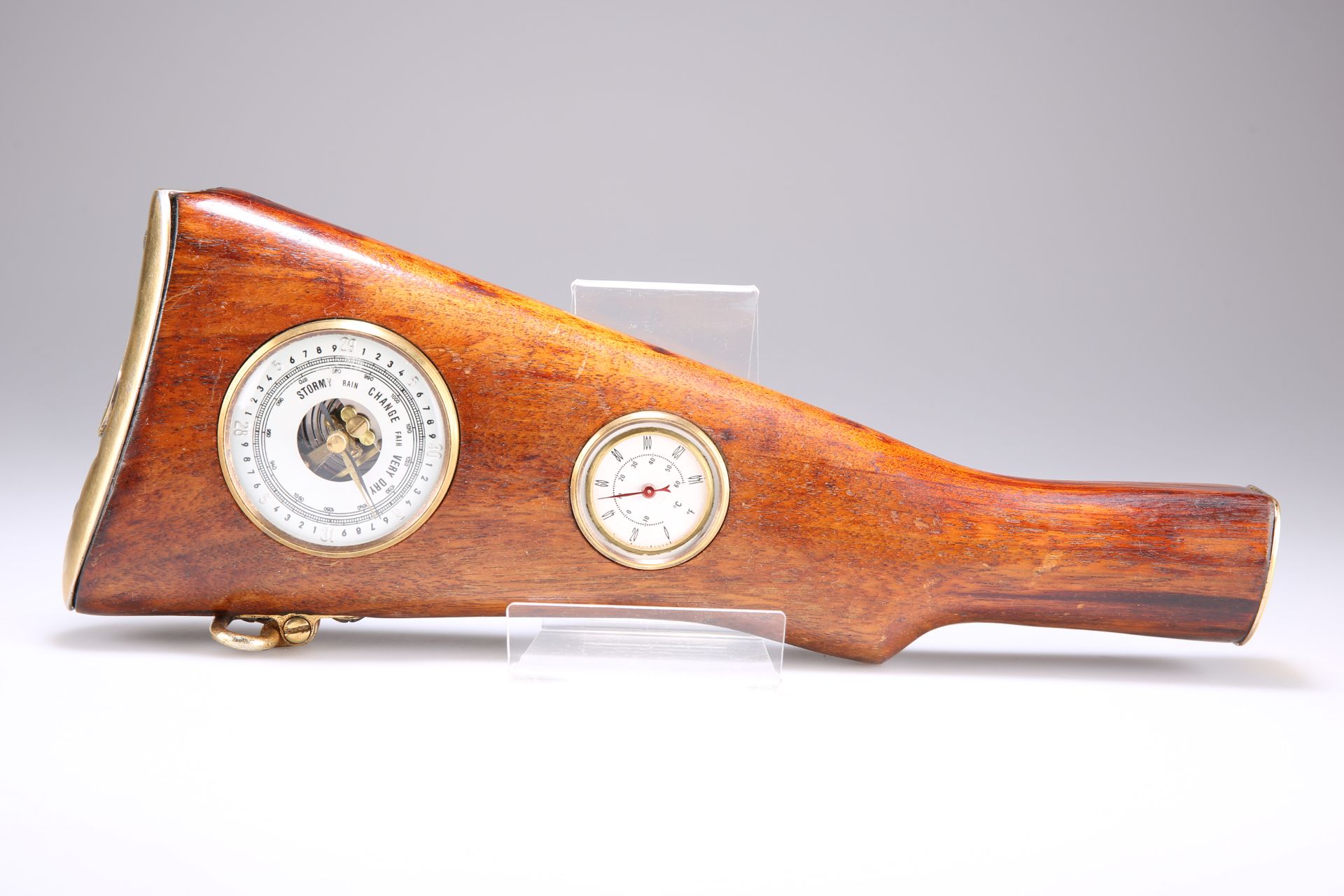 A PRESENTATION BAROMETER MOUNTED INTO A RIFLE STOCK