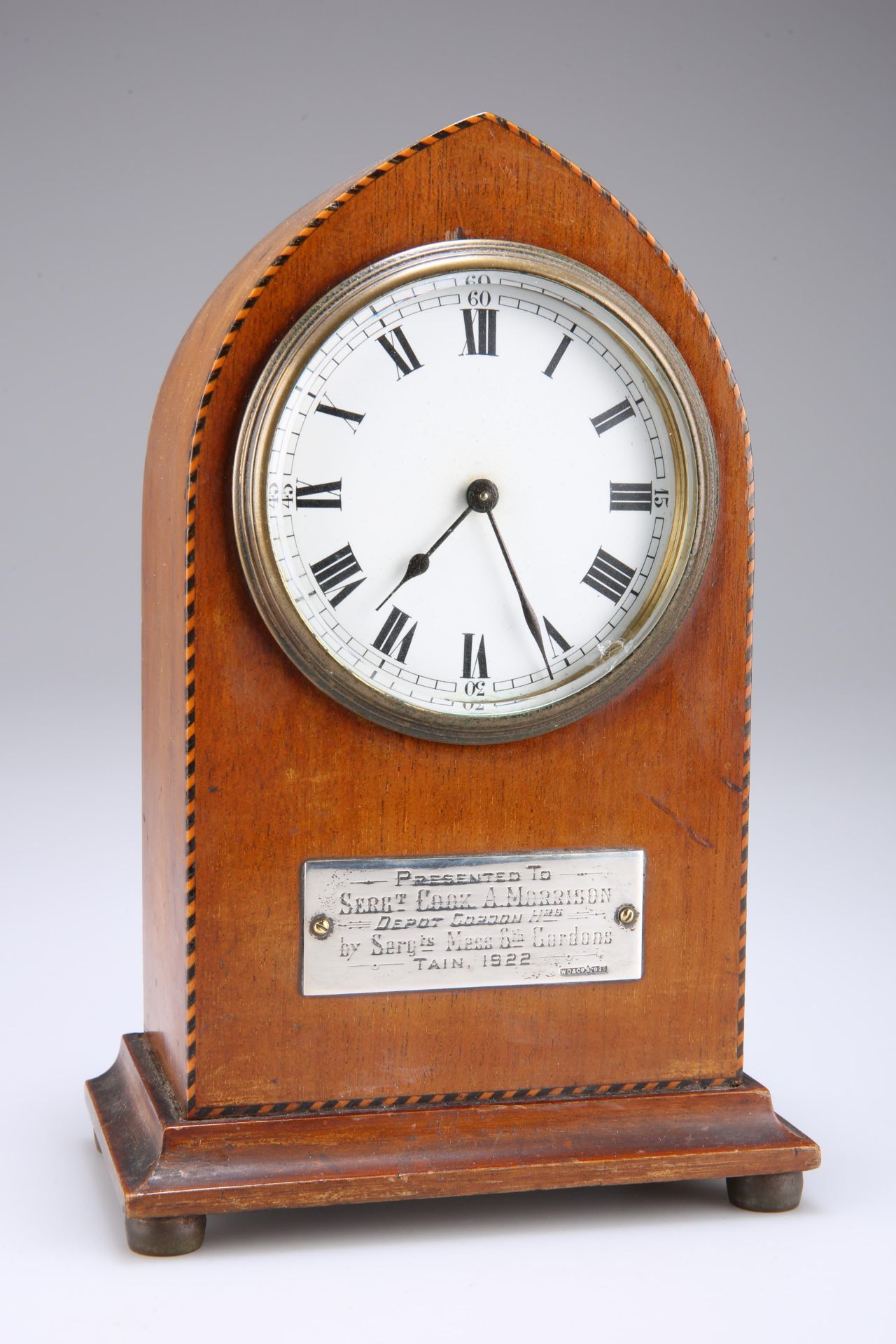 A PRESENTATION MAHOGANY VENEERED MANTEL CLOCK