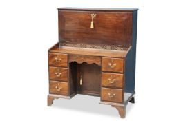 A GEORGE III MAHOGANY FALL-FRONT DESK