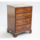 A GEORGE III STYLE MAHOGANY CHEST OF DRAWERS