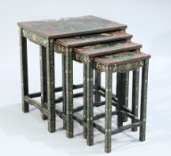 A SET OF FOUR CHINOISERIE LACQUER NESTING TABLES