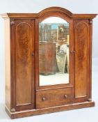 A VICTORIAN MAHOGANY THREE-DOOR WARDROBE