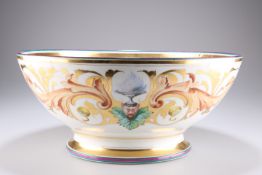 A LARGE CONTINENTAL PAINTED AND GILDED PORCELAIN BOWL