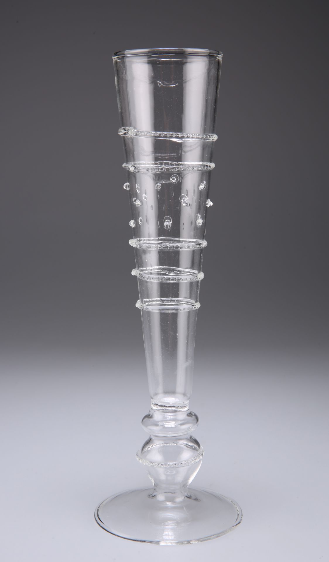 A VENETIAN GLASS FLUTE, CIRCA 1900