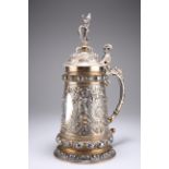 A LARGE LATE 19TH/EARLY 20TH CENTURY PARCEL-GILT SILVER-PLATED LIDDED TANKARD