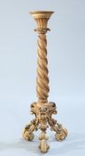 A 19TH CENTURY CARVED PINE TORCHERE