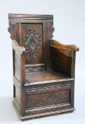 A 17TH CENTURY OAK WAINSCOT ARMCHAIR