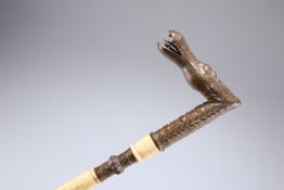 A BRASS-MOUNTED BONE WALKING STICK