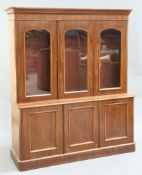 A VICTORIAN MAHOGANY BOOKCASE CABINET