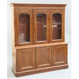 A VICTORIAN MAHOGANY BOOKCASE CABINET