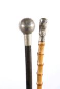 A BALL-TOPPED SWAGGER STICK BEARING THE BADGE OF THE 8TH GURKHA RIFLES