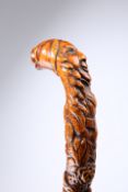 AN 18TH CENTURY CARVED WALKING STICK