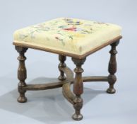 AN 18TH CENTURY OAK STOOL