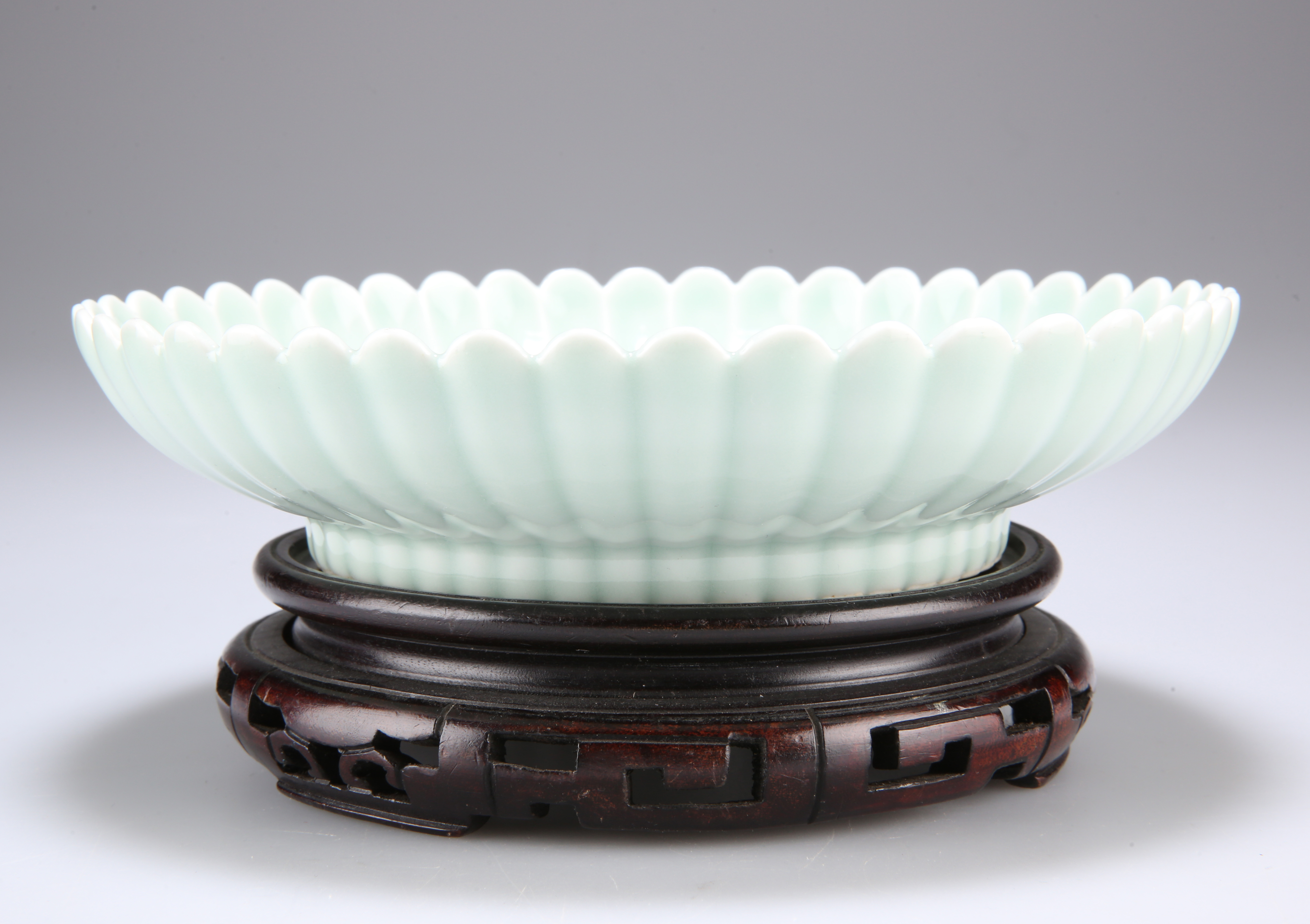 A CHINESE CELADON GLAZE PORCELAIN DISH