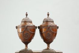 A HANDSOME PAIR OF ADAM REVIVAL MAHOGANY URNS