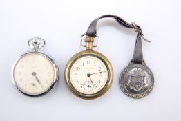 A BRASS CASED POCKET WATCH