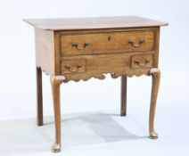 A GEORGE III MAHOGANY LOWBOY