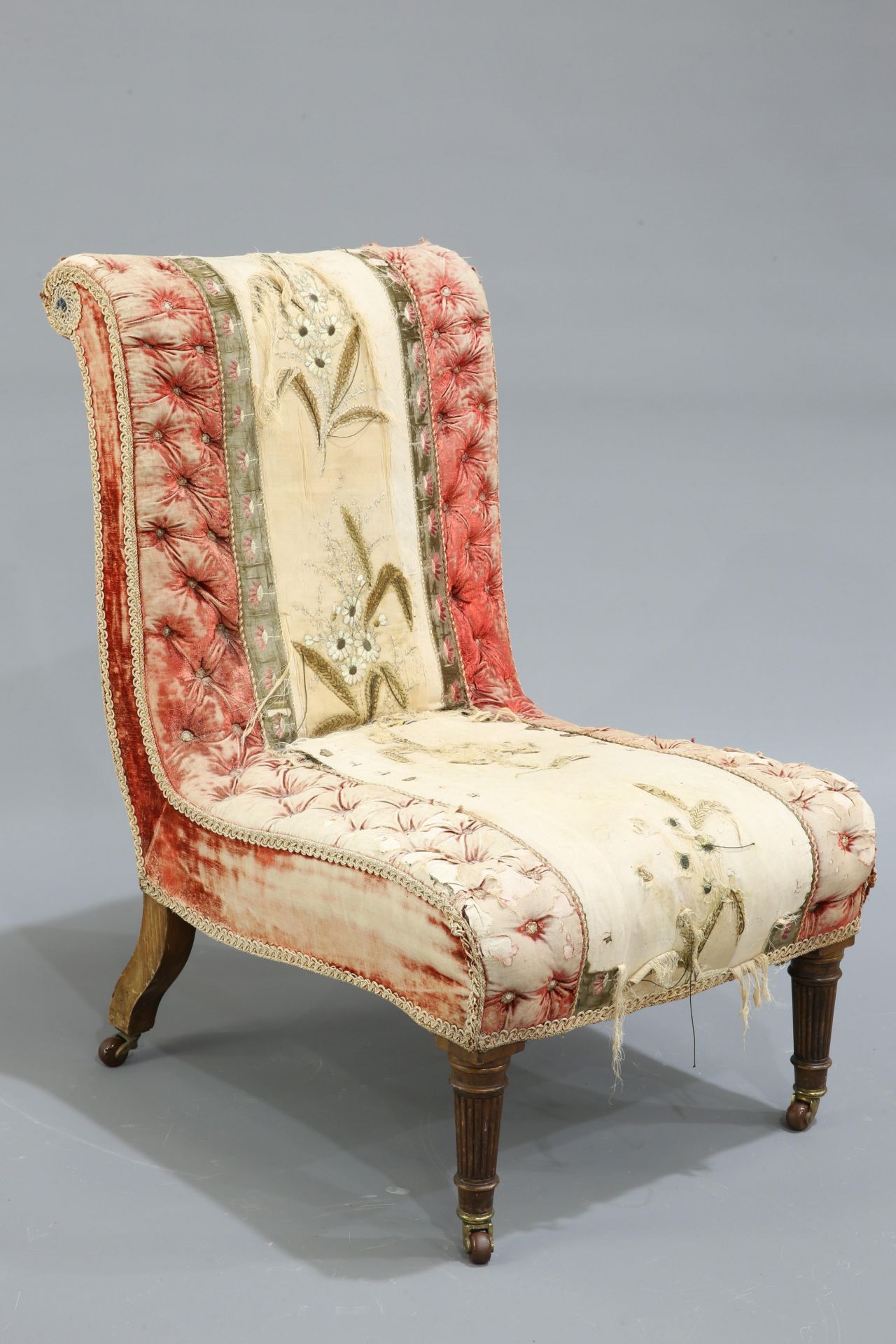 A REGENCY UPHOLSTERED NURSING CHAIR