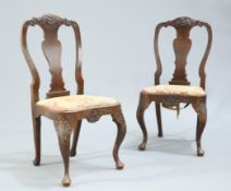 A PAIR OF GEORGE I STYLE CARVED OAK SIDE CHAIRS