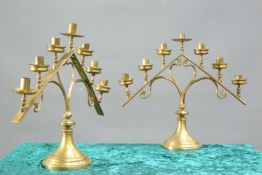 A PAIR OF 19TH CENTURY BRASS SEVEN-LIGHT ECCLESIASTICAL CANDELABRA