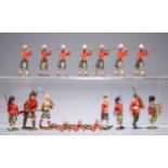 BRITAINS LTD, SEVEN STANDING INFANTRYMAN AND THREE PRONE