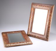 A PAIR OF 19TH CENTURY GILT-TOOLED LEATHER MIRRORS