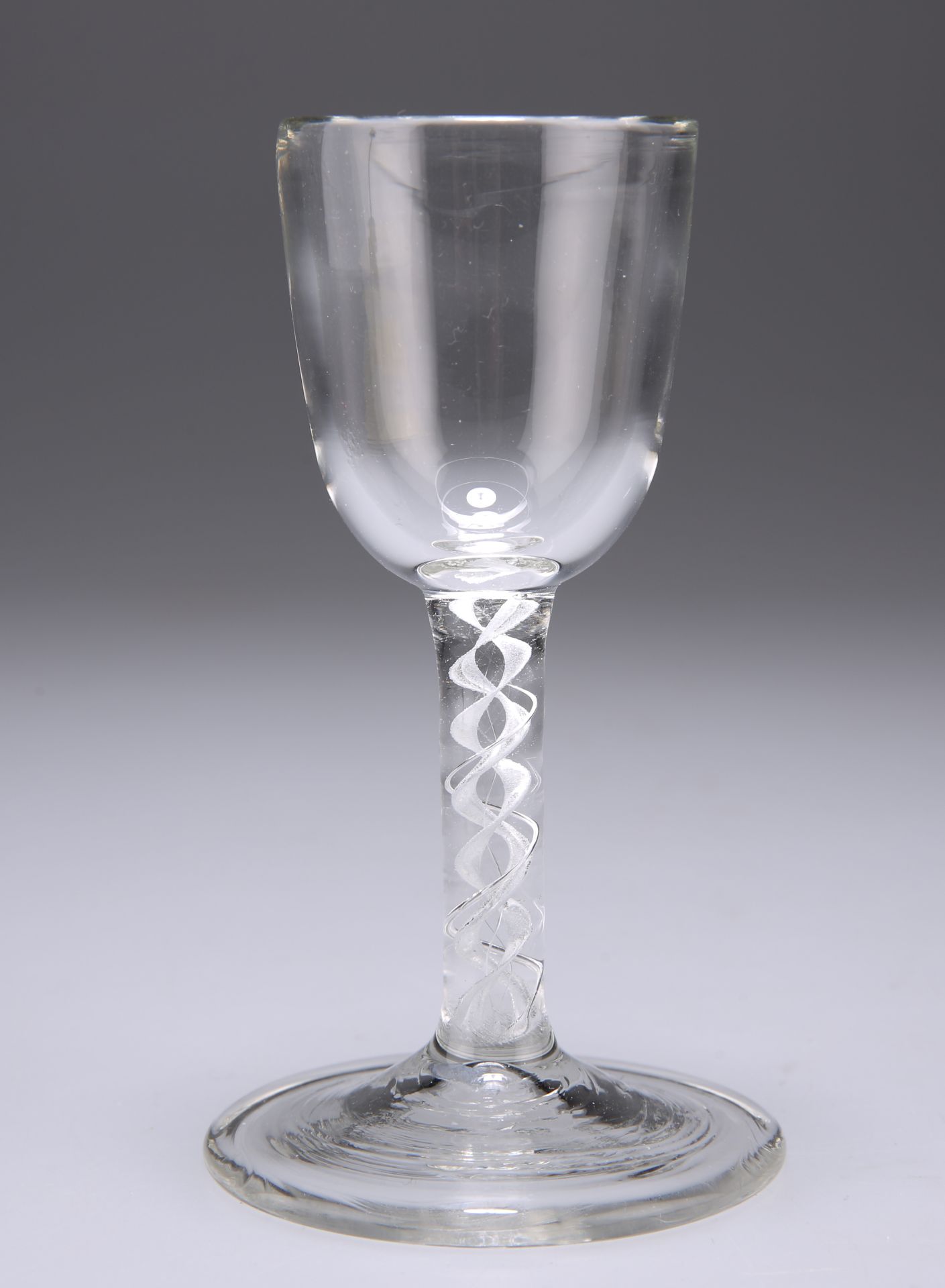 A GROUP OF SEVEN DRINKING GLASSES