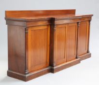 AN EARLY 19TH CENTURY MAHOGANY BREAKFRONT SIDE CAB