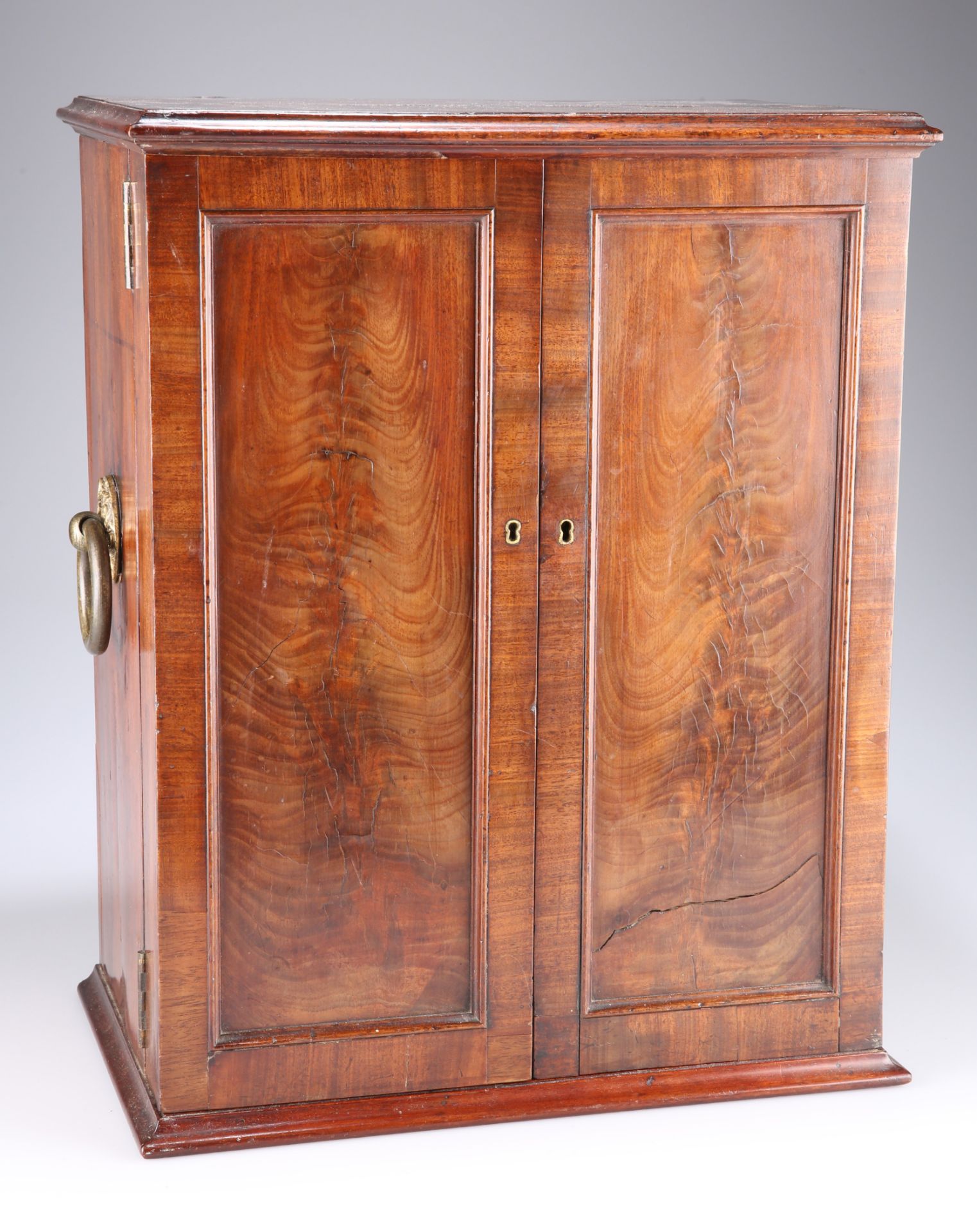 AN OFFICERS' WALNUT CAMPAIGN TOILETRY CABINET