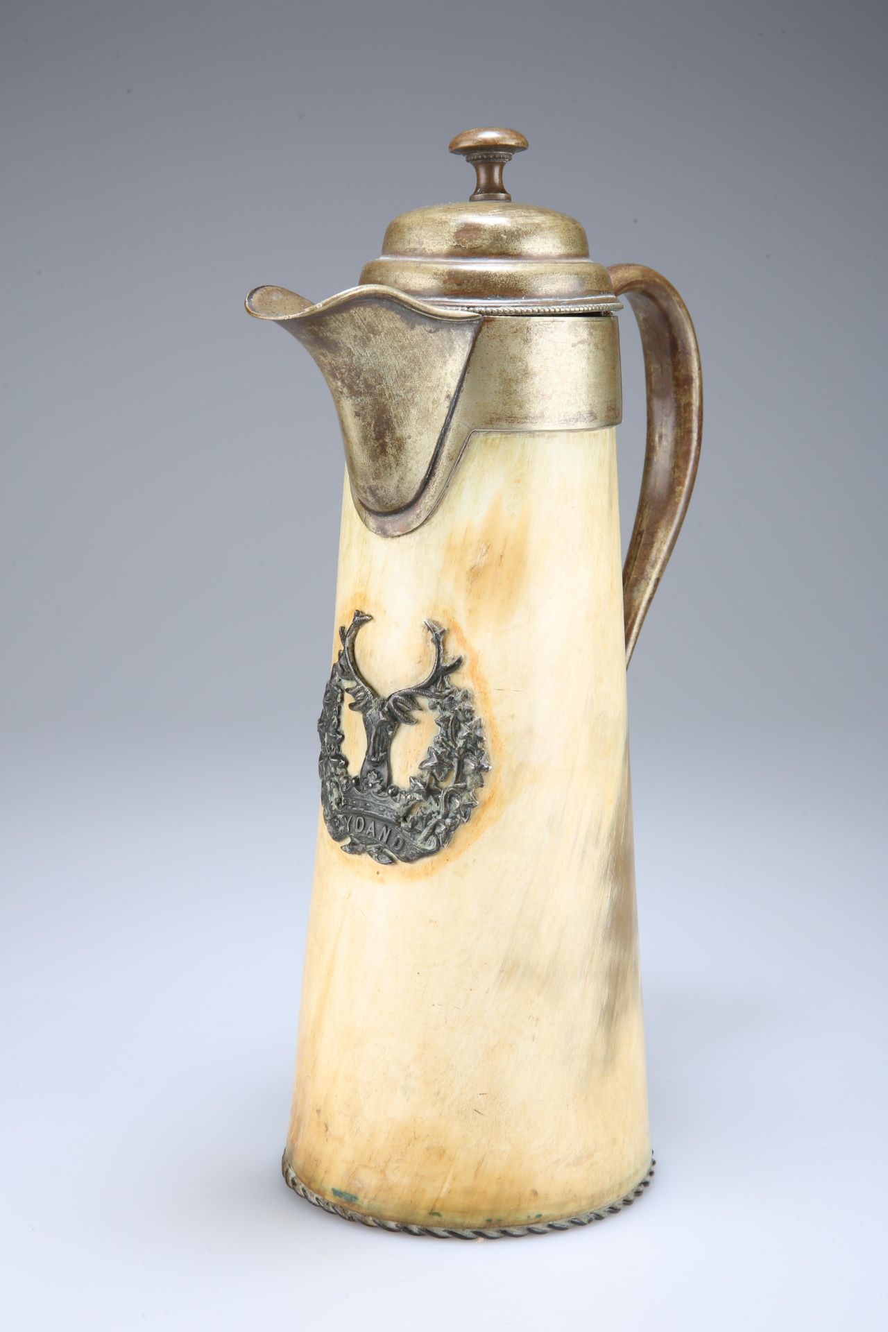 A HORN BODIED CLARET JUG