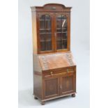 A 1920'S MAHOGANY BUREAU BOOKCASE