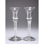 A PAIR OF WINE GLASSES