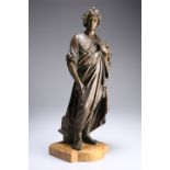 A PATINATED BRONZE FIGURE