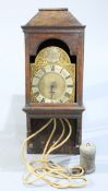 A BRASS LANTERN CLOCK